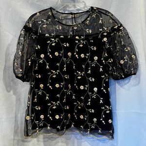 Cirana blouse with growing flower vines stitched over sheer layer, ruffle sleeve